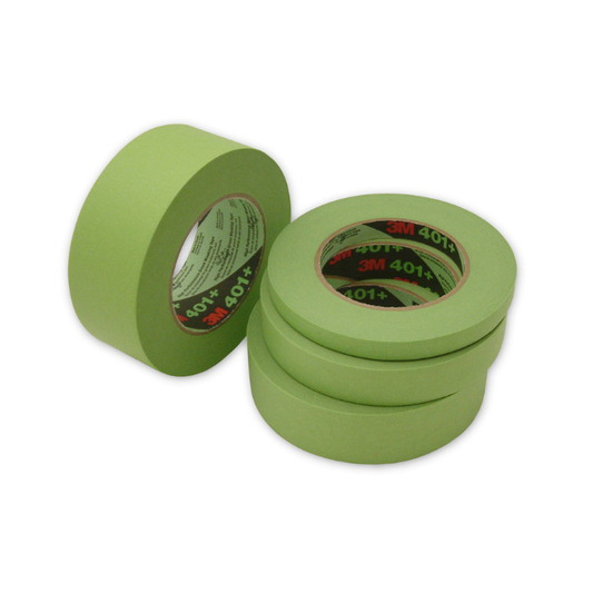 Three rolls of green tape stacked on a white background
